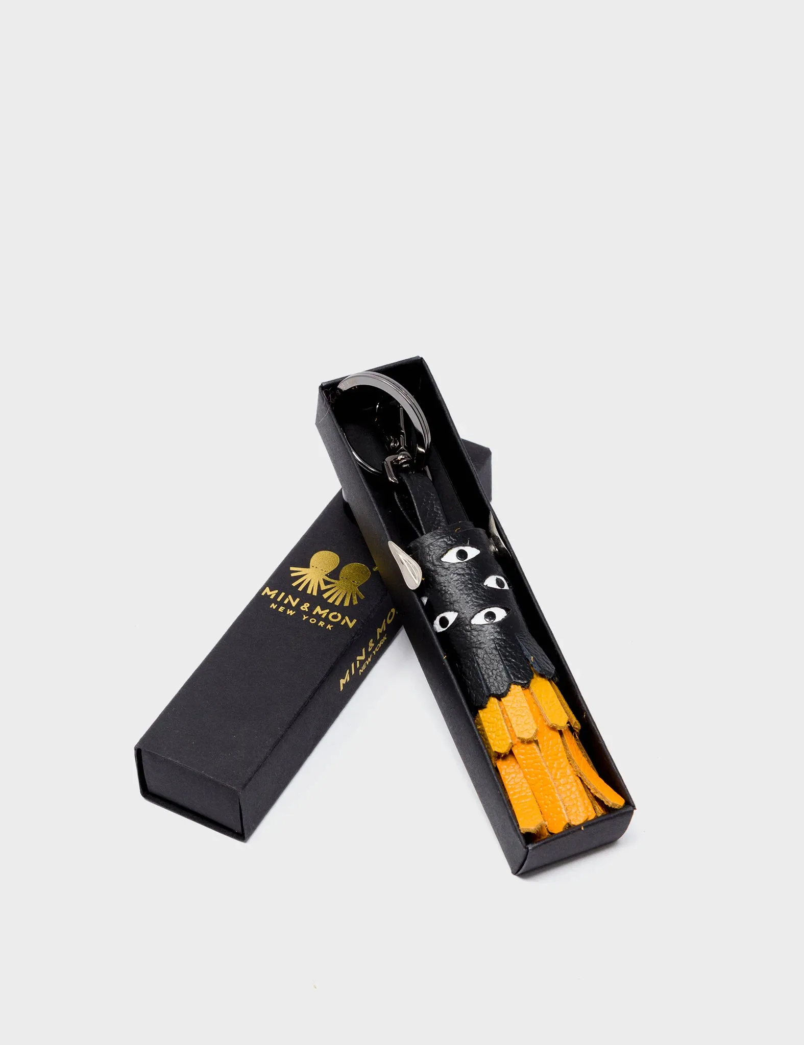 Oliver The Ox Charm - Black and Golden Glow Leather Keychain